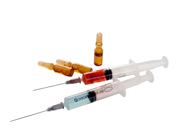 Filed syringes and ampule — Stock Photo, Image