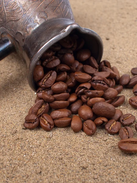 Cezve and coffee beans closeup view — Stock Photo, Image