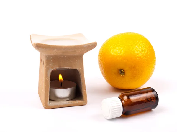 stock image Aroma lamp with citrus oil and citrus
