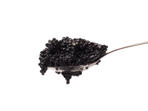 Svart kaviar i sked — Stockfoto