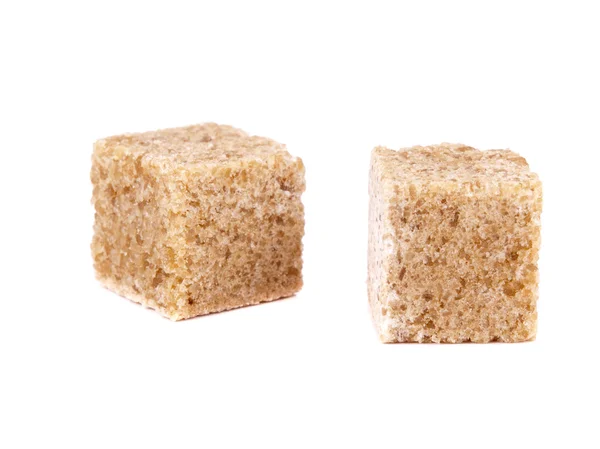 Due cubetti di zucchero di canna — Foto Stock