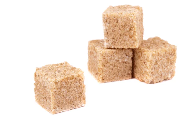 Cuatro cubos de azúcar de caña — Foto de Stock