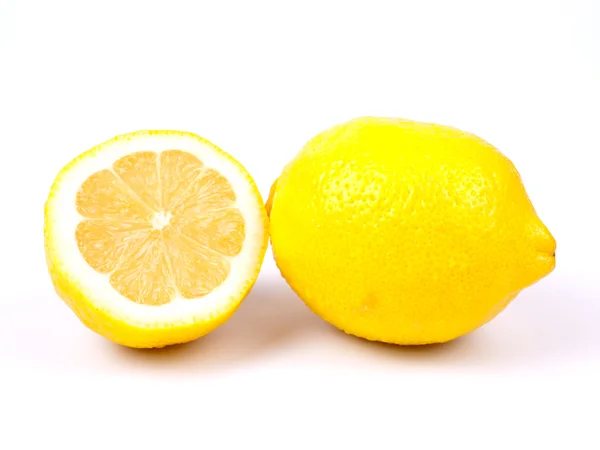 Citron och hälften av citron Stockbild