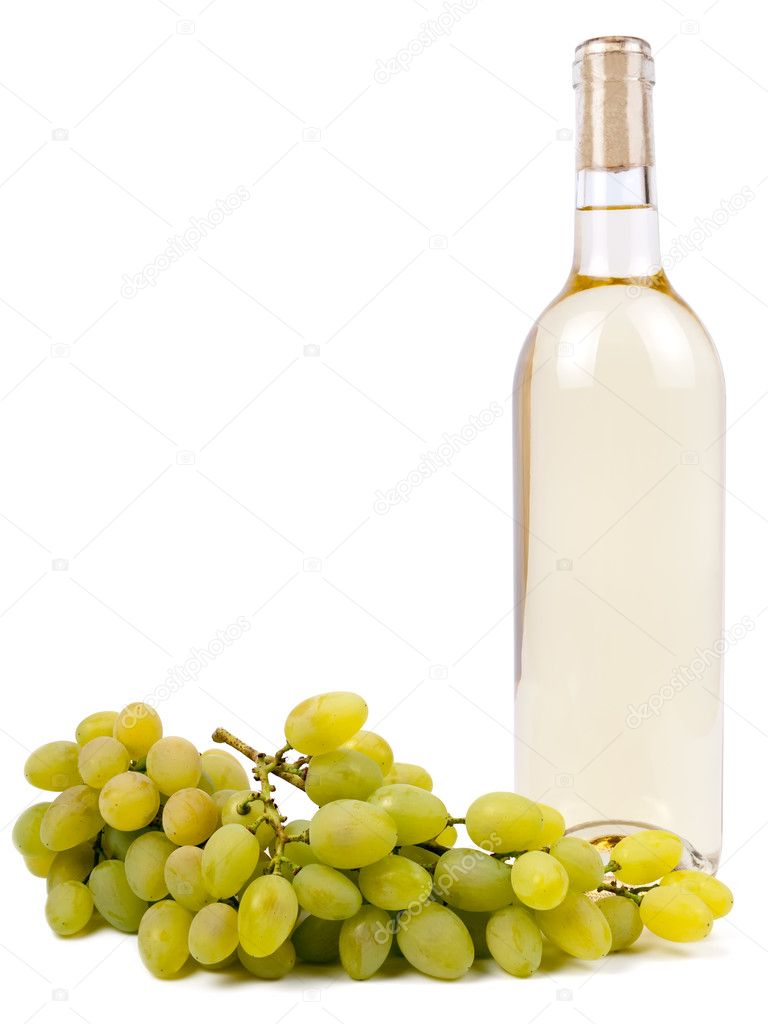 White wine in bottle and grapes