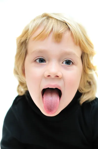 Malá dívka zobrazeno jazyk — Stock fotografie