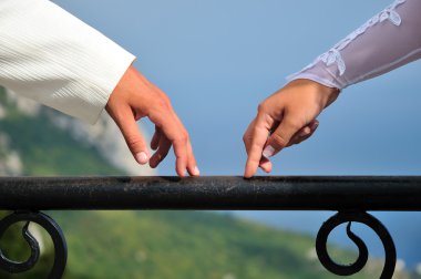 Hands of bride and groom clipart