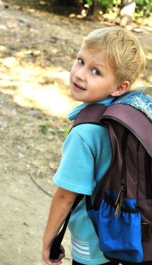 Schoolboy with backpack clipart