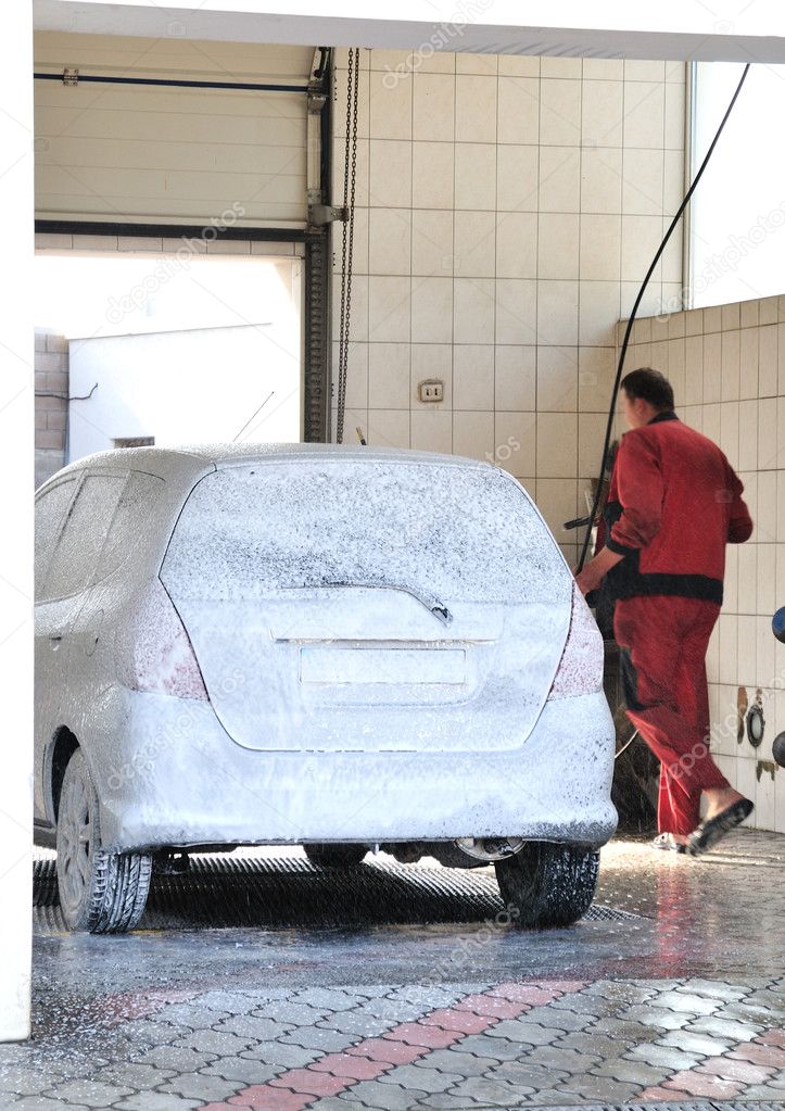 Washerman washing Car