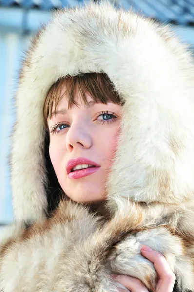 Beautiful tender woman in fur hat — Stock Photo, Image