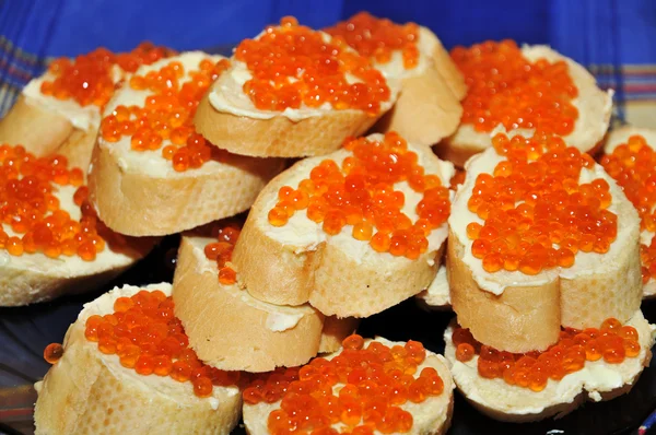 Sandwiches with red caviar. Stock Photo