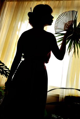 Shadow-figure of oriental woman clipart