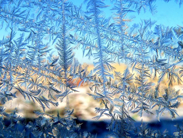 Wintermuster auf Fensterglas — Stockfoto