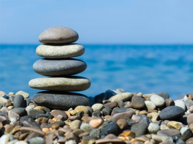 Stack of stones on beach clipart
