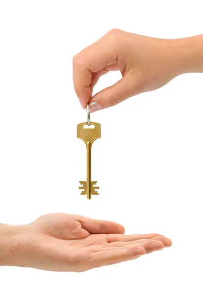 Mãos e chave — Fotografia de Stock