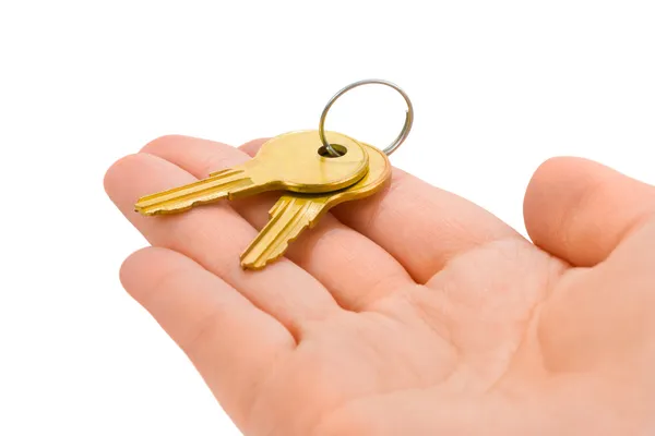 Hand geven sleutels — Stockfoto