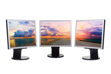 Panorama of sunset on computer screens clipart