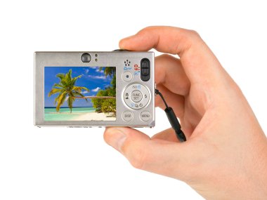 Hand with camera and landscape (my photo clipart