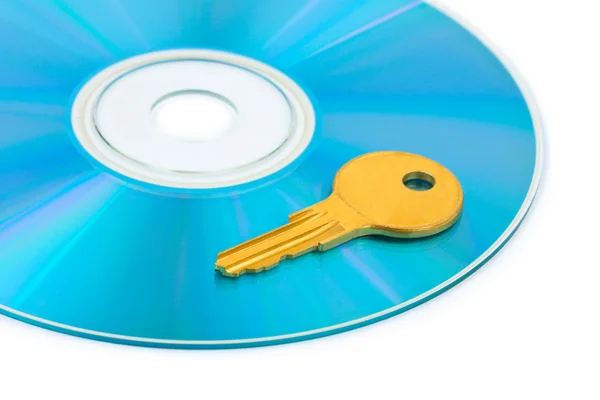 Комп'ютерний диск і ключ — стокове фото