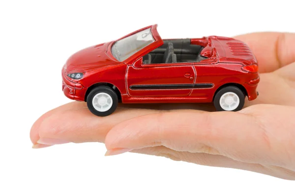 Hand and toy car — Stock Photo, Image