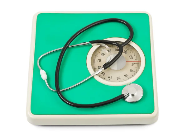 Stetoskop na váha měřítko在体重秤上听诊器 — Stock fotografie