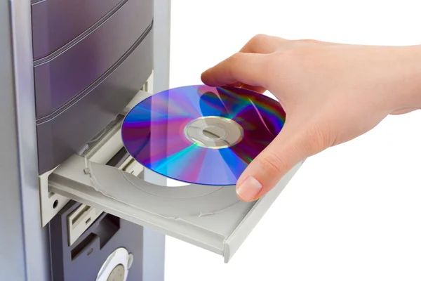 Hand en computer-cd-rom — Stockfoto