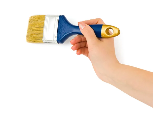 Hand with paintbrush — Stock Photo, Image