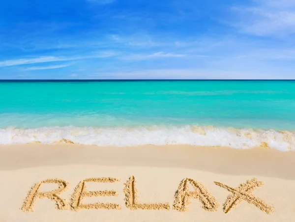 Word Relax on beach — Stock Photo, Image