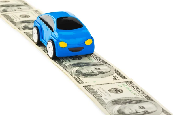 Toy car on money road — Stock Photo, Image