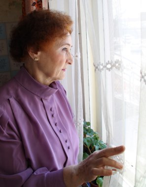 Woman looking outside clipart