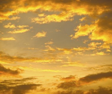 Golden clouds background clipart