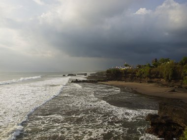 Tanah Lot stormy sunset clipart