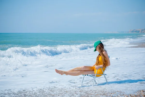 Slim woman in waves — Stock Photo, Image