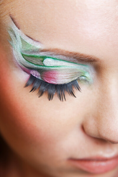 Fashion eye multicolored make-up close-up macro, shallow DOF