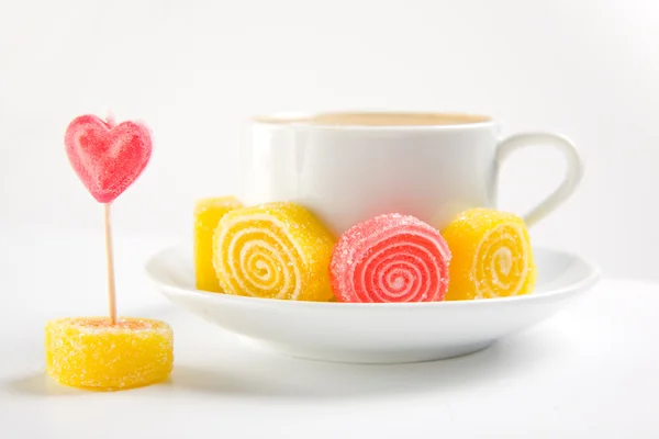 Cappuccino with candies — Stock Photo, Image