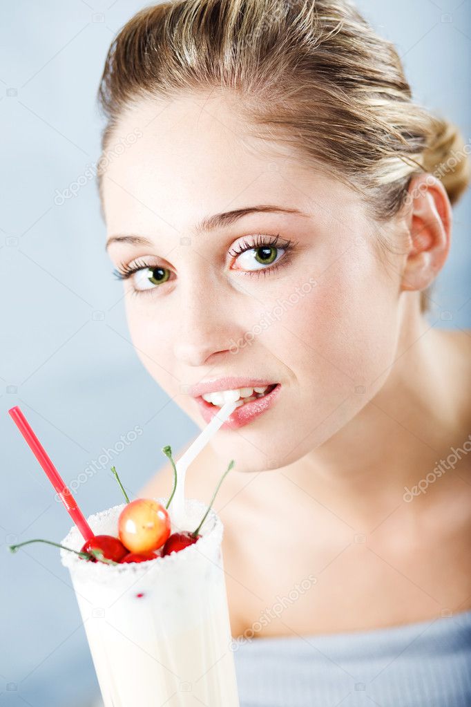 Girl drinking milk cocktail — Stock Photo © alenkasm 1247036