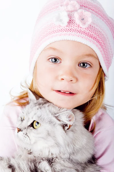 Ребенок и котенок — стоковое фото