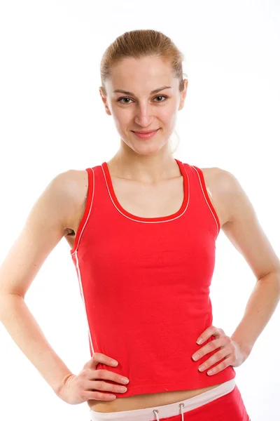 Sportovní blondýna v červený trikot — Stock fotografie