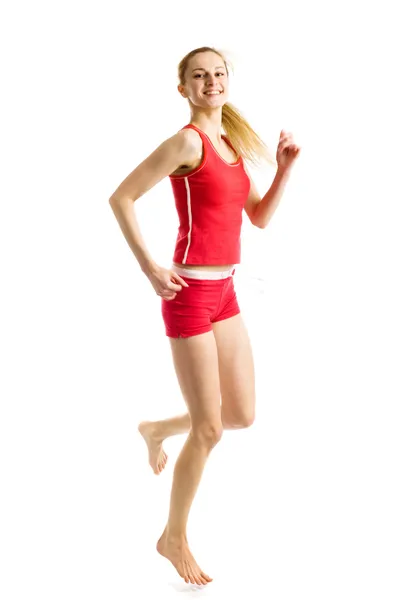 Blond girl doing gymnastic exercises — Stock Photo, Image