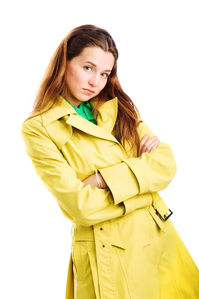 Žena v žlutá pláštěnka — Stock fotografie