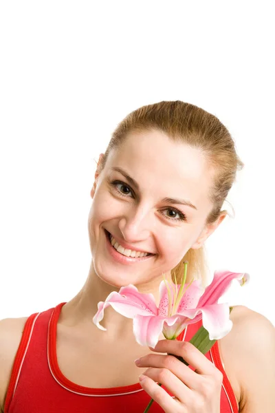 Nice girl with a pink lily — Stock Photo, Image
