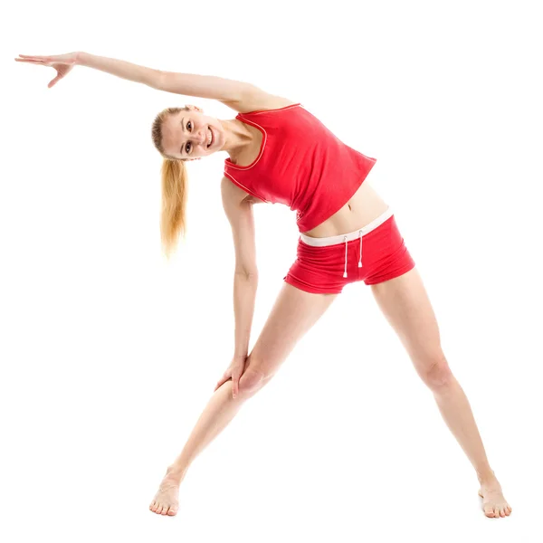 Blondýnka dělá gymnastické cvičení — Stock fotografie