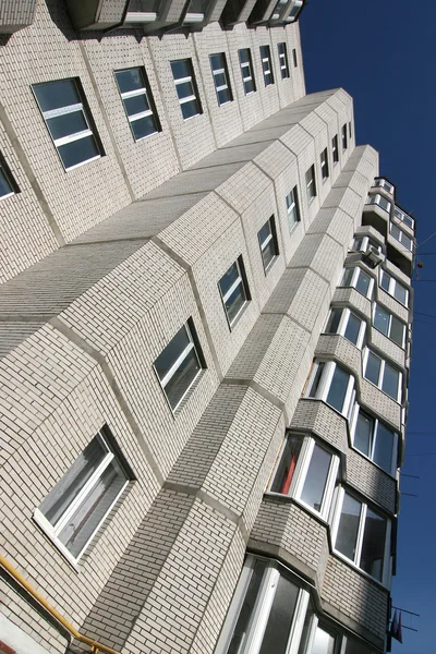Multi-storey house of white brick — Stock Photo, Image