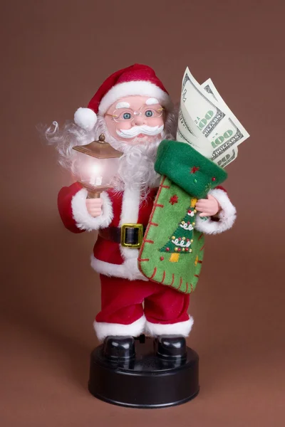 Weihnachtsmann mit Geld — Stockfoto