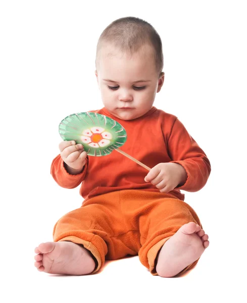 Härlig liten pojke med lollipop — Stockfoto