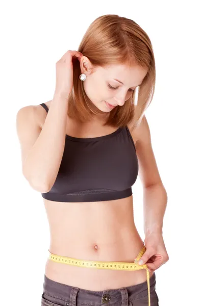 젊은 여자는 허리를 측정 — 스톡 사진