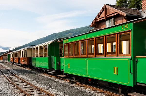 Historical railroad cars at station