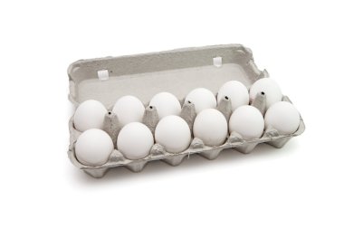 Twelve eggs in a paper box isolated clipart