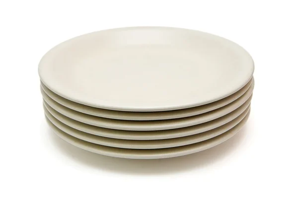 Verem a sima bézs vacsora tányérok — Stock Fotó
