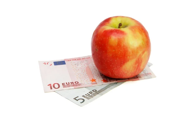 Fresh apple on euro banknotes — Stock Photo, Image