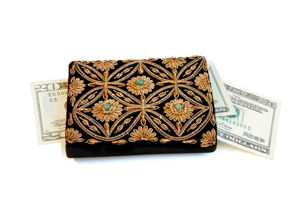 Embroidered purse with dollars — Stock Photo, Image